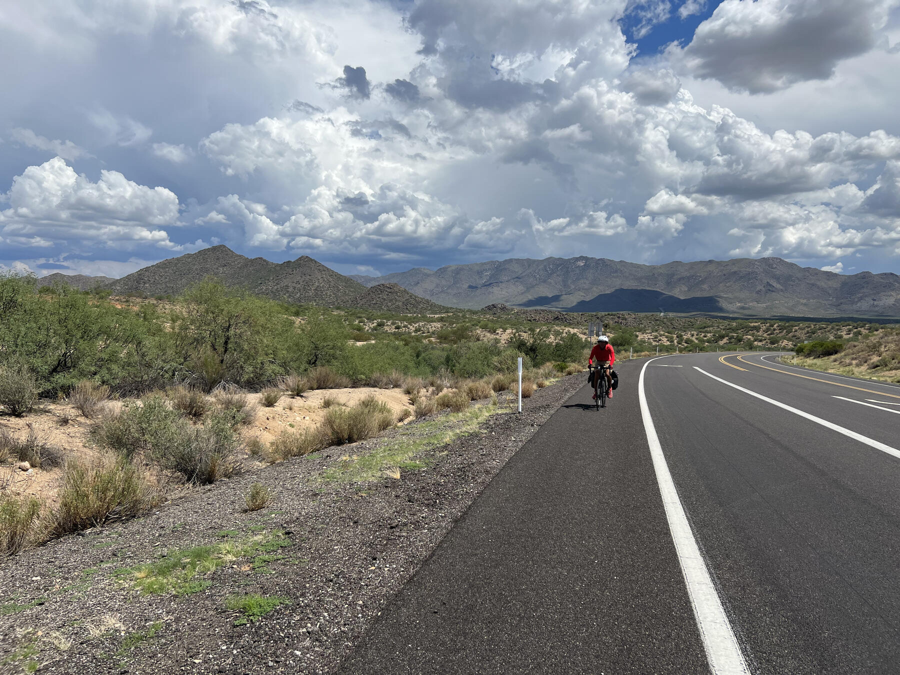 Jules cycling through the Arizona desert mountains